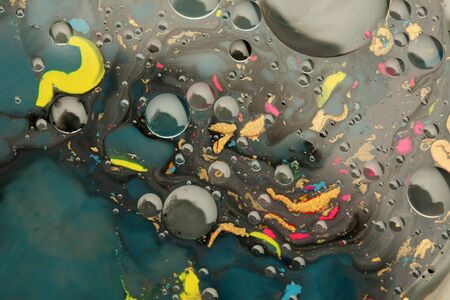 Abstract blot bubble background. Marble texture. Acrylic color in water and oil.の写真素材