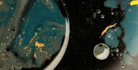 Macro Abstract texture background. Acrylic color in water and oil.の写真素材