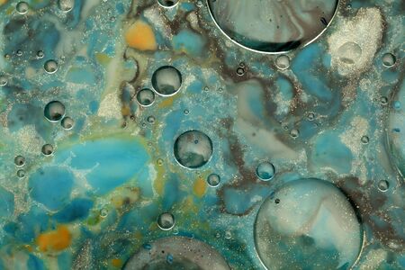 Abstract background. Blot painting marble texture. Acrylic color in water and oil.