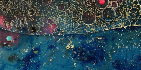 Abstract background. Blot painting marble texture. Acrylic blue color in water and oil.