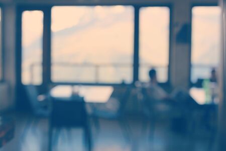 Vintage Abstract blue blur background. De-focuses cafe interior. の写真素材