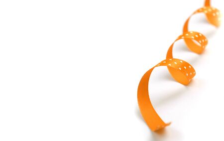 Color orange silk ribbon with dots on white backgroundの写真素材