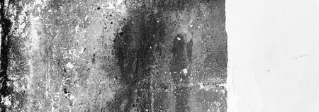Black and white empty grunge dirty  brush stroke concrete wall. Abstract background. Horizontal long poster, greeting cards, web site, banner, invitation.の写真素材
