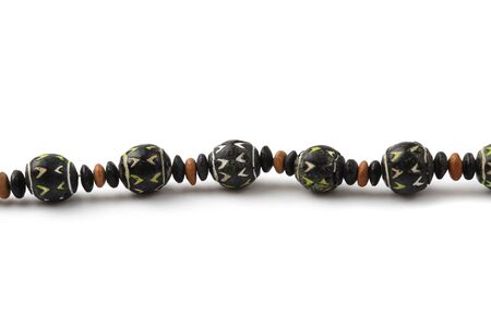 Black wooden Bead bracelet on white background.の写真素材