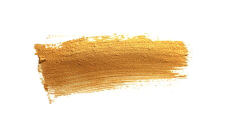 Gold (bronze) glittering color smear brush stroke stain blot on white background. Abstract Paint texture.の写真素材