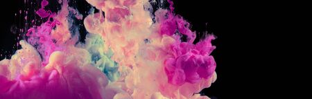 Acrylic pink colors in water. Ink blot. Abstract smoke black background. Horizontal long poster, greeting cards, web site, banner, invitation.の写真素材