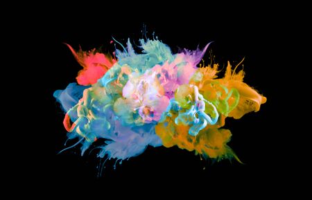 Acrylic colors in water. Ink blot. Abstract background. Isolated on black.の写真素材