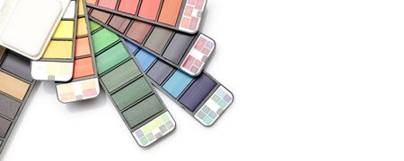 Watercolor paint rainbow palette on white background. Flat lay. Top view.. Horizontal long poster, greeting cards, web site, banner, invitation.の写真素材