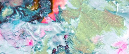 Abstract color background. Acrylic blue paint with sparkles. Colorful blots. Marble texture. Horizontal long banner.の写真素材