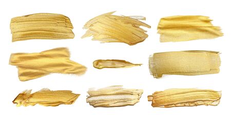 Gold (bronze) glittering color smear brush stroke stain blot on white background. Abstract Paint texture. Colleclion. の写真素材