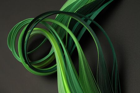 Green color strip wave paper on blackの写真素材