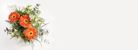 Gerbera Flower bouquet on gray horizontal backgroundの写真素材