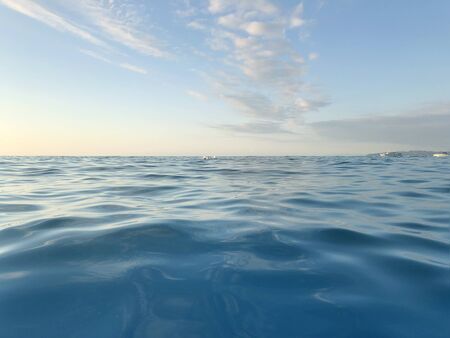 Blue Sea wave surface and cloud sky. Relax Nature water background.の写真素材