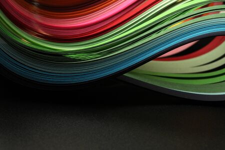 Rainbow color strip wave paper. Abstract texture black horizontal background.の写真素材