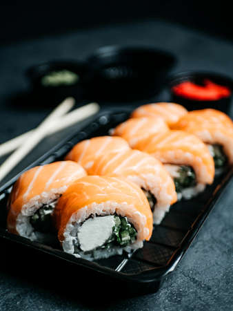 Sushi with chopsticks, ginger, wasabi and soy sauce. selective focusの写真素材