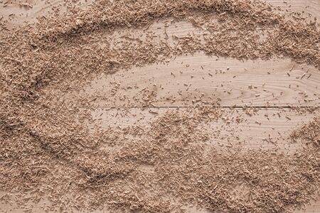 wood shavings on a wooden background from oak planks with expressive texture and natural patternの写真素材