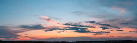Colorful cloudy sky at sunset. Gradient color. Sky texture, abstract nature backgroundの写真素材