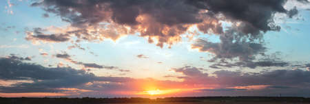 Colorful cloudy sky at sunset. Gradient color. Sky texture, abstract nature backgroundの写真素材