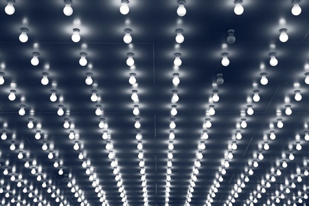 Light bulbs. Close up image of Chicago theater entrance ceiling made with light bulbs.の写真素材