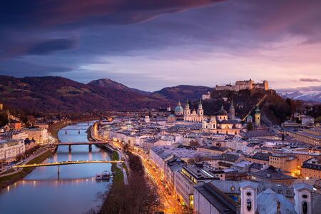 Salzburg, Austria. Cityscape image of the Salzburg, Austria with Salzburg Cathedral during beautiful winter sunset.の写真素材
