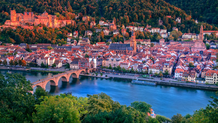 Heidelberg, Germany. Aerial cityscape image of historical city of Heidelberg, Germany with Old Bridge Gate at autumn sunset.の写真素材
