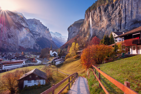 Lauterbrunnen, Switzerland. Landscape image of iconic village Lauterbrunnen, located in Swiss Alps, Switzerland at beautiful autumn sunrise.の写真素材