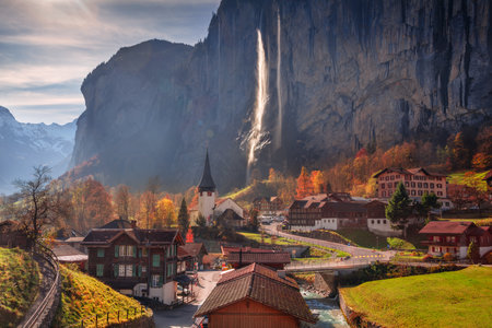 Lauterbrunnen, Switzerland. Landscape image of iconic village Lauterbrunnen, located in Swiss Alps, Switzerland at beautiful autumn sunrise.の写真素材