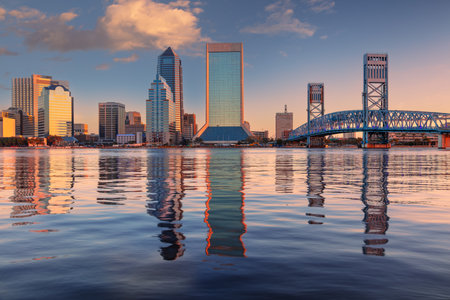 Jacksonville, Florida, USA. Cityscape image of Jacksonville, Florida with reflection of the city skyline in the water at beautiful sunrise.の写真素材