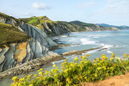 The Acantilado Flysch in Zumaia - Basque Country. Flysch is a sequence of sedimentary rock layers...