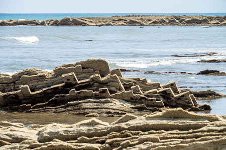 Flysch Coast of Sakoneta, Zumaia, Spain. Flysch is a sequence of sedimentary rock layers that...