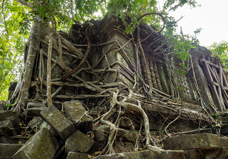 Ruins of ancient Beng Mealea Temple over jungle, Cambodia. Beng Mealea is a temple in the Angkor Wat...