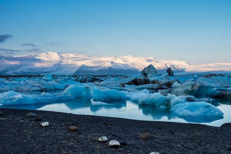 Icebergs in the glacier lagoon of Joekulsarlon in Iceland, Europe.
