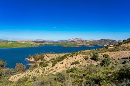 Beautiful view of the lake Embalse del Guadalhorce, Ardales Reservoir in province Malaga, Andalusia, Spainの写真素材