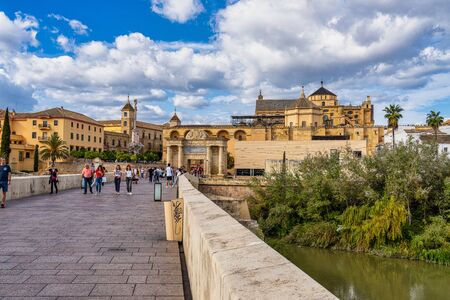 Cordoba, Spain - October 31, 2019: Mezquita-Catedral and Puente Romano - Mosque-Cathedral and the Roman Bridge in Cordoba, Andalusia, Spainのeditorial素材