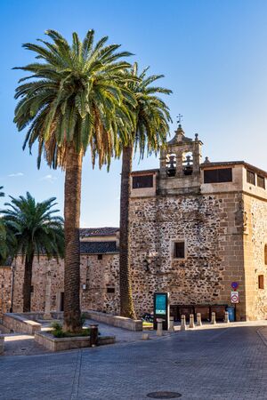 Narrow alley with old stone buildings at Caceres, Extremadura, Spain. A cute and charming town with...