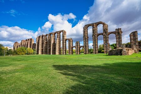 The Acueducto de los Milagros, Miraculous Aqueduct in Merida, Extremadura, Spain is a ruined Roman aqueduct bridge, part of the aqueduct built to supply water to the Roman colony of Emerita Augusta, today Merida, Spain.の写真素材