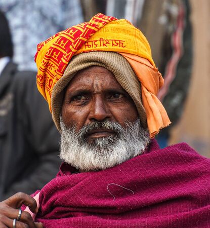 Varanasi, India - Dec 23, 2019: Sadhu at the ghats in Varanasi, Uttar Pradesh, ascetic holy mans in...