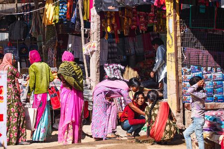 Jaisalmer, India - Dec 31, 2019: Indian Rajasthani people in national clothes in the streets of Jaisalmer, Rajasthanのeditorial素材