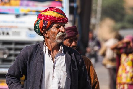 Jaisalmer, India - Dec 31, 2019: Indian Rajasthani people in national clothes in the streets of...
