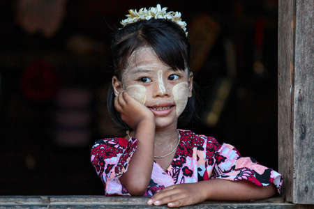 Bagan, Myanmar - Nov 14, 2019: Burmese girl looking out of window in Bagan, Myanmar former Burma in Asiaのeditorial素材