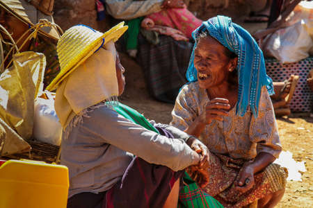 Heho, Myanmar - Nov 08, 2019: People at a market in the city center of Heho in Myanmar, former Burma in Asiaのeditorial素材