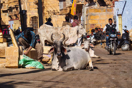 Jaisalmer, India - Dec 29, 2019: Indian Rajasthani people in national clothes in the streets of Jaisalmer, Rajasthanのeditorial素材