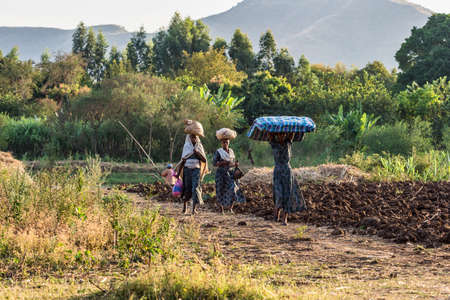 Tis Issat, Ethiopia - Feb 05, 2020: People living near the Blue Nile falls, Tis-Isat Falls, meaning great smoke in Amharic in Amara region of Ethiopia, Eastern Africaのeditorial素材