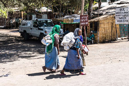 Lalibela, Ethiopia - Feb 12, 2020: Ethiopian people seen on the road from Lalibela to Gheralta, Tigray in Northern Ethiopia, Africaのeditorial素材