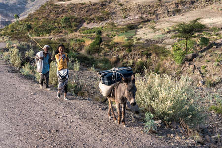 Lalibela, Ethiopia - Feb 12, 2020: Ethiopian people seen on the road from Lalibela to Gheralta, Tigray in Northern Ethiopia, Africaのeditorial素材