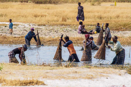 Opuwo, Namibia - Jul 06, 2019: Namibian people working on the fields seen in Opuwo in the Kunene...