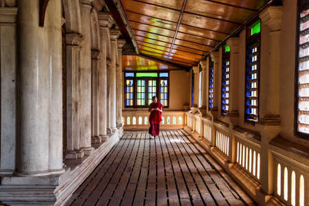 Mawlamyine, Myanmar - Nov 05, 2019: Monk at Monastery of Kyaung Seindon Mibaya at Mawlamyine in Myanmar, former Burma in Asiaのeditorial素材