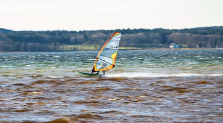 Starnberg, Germany - Sep 19, 2019: Surfer at Lake Starnbeger in Upper Bavaria, Germanyのeditorial素材