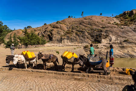 Aksum, Ethiopia - Feb 09, 2020: people at the ruins of the baths of the Queen of Saba, Africaのeditorial素材