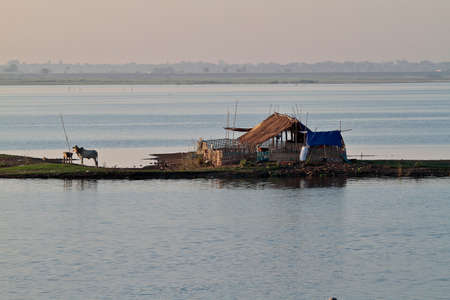 Mandalay, Myanmar - Nov 12, 2019: Fishermen near U Bein bridge in Amarapura,Mandalay Myanmarのeditorial素材